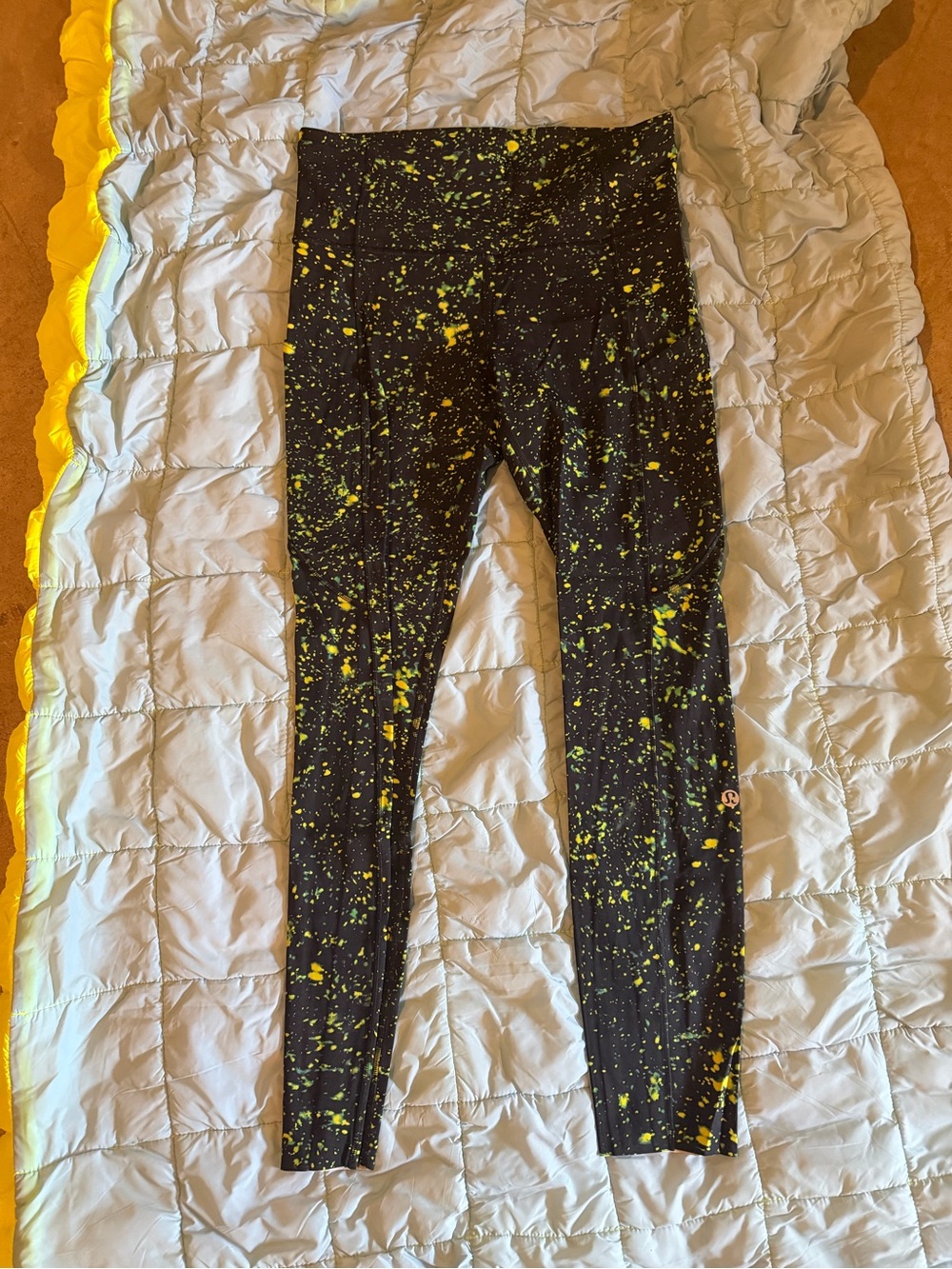 Like new lululemon athletica Black Leggings with Yellow and green Paint Splatter